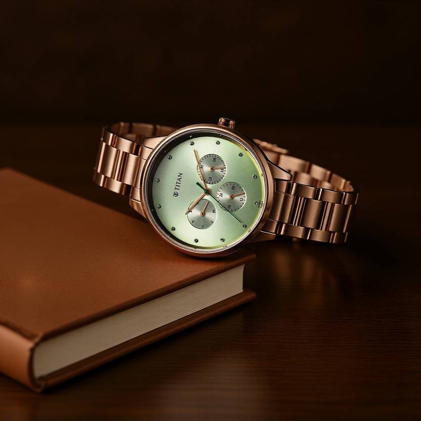 titan purple razzle dazzle green dial stainless steel strap analog watch women