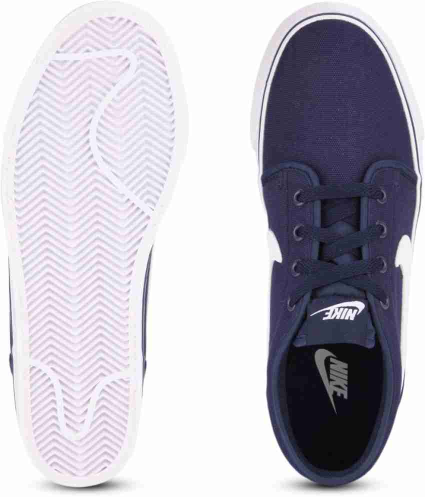 Nike toki best sale low blue