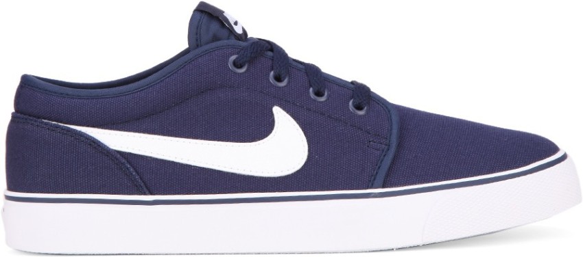 Nike toki hot sale low leather