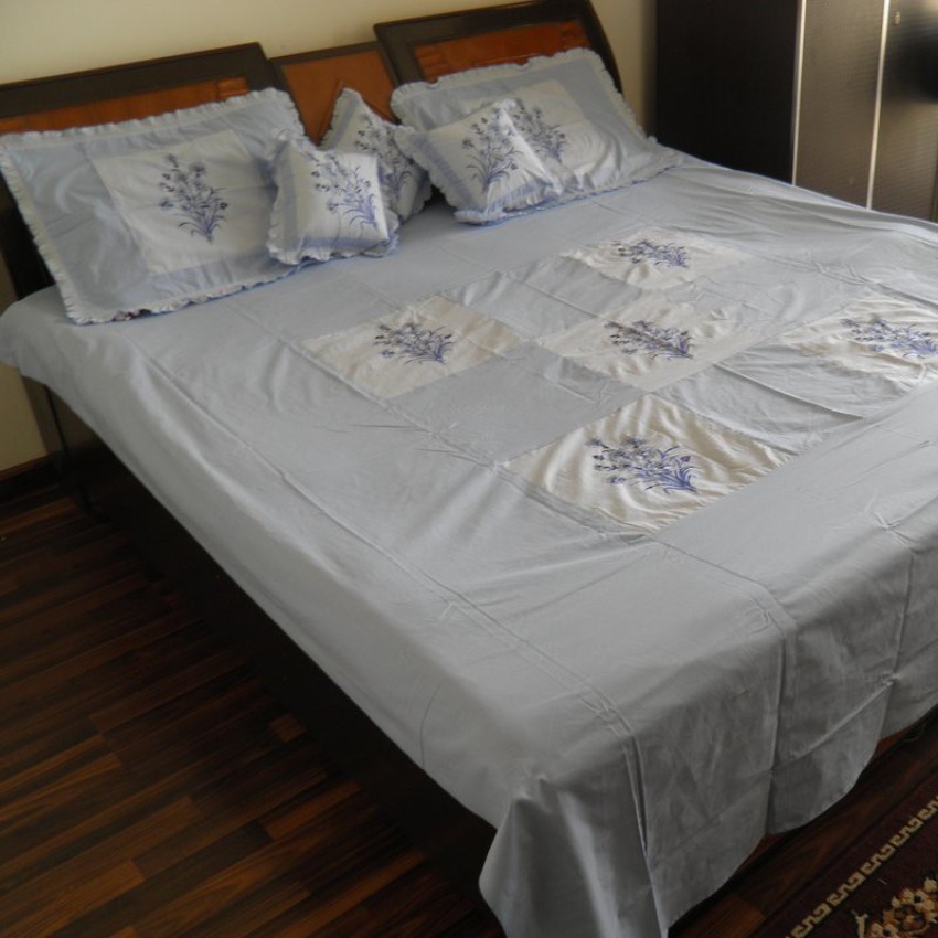 blue color cotton Double bedsheet with 3 cushion cover with filler