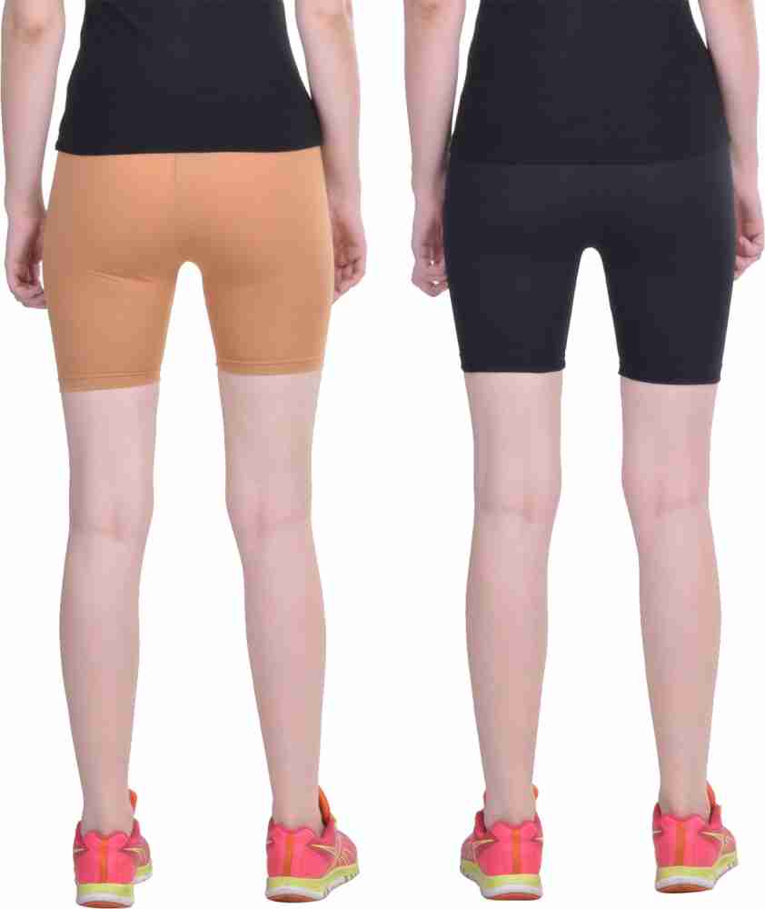 Women are working out in flesh-coloured bike shorts that make them