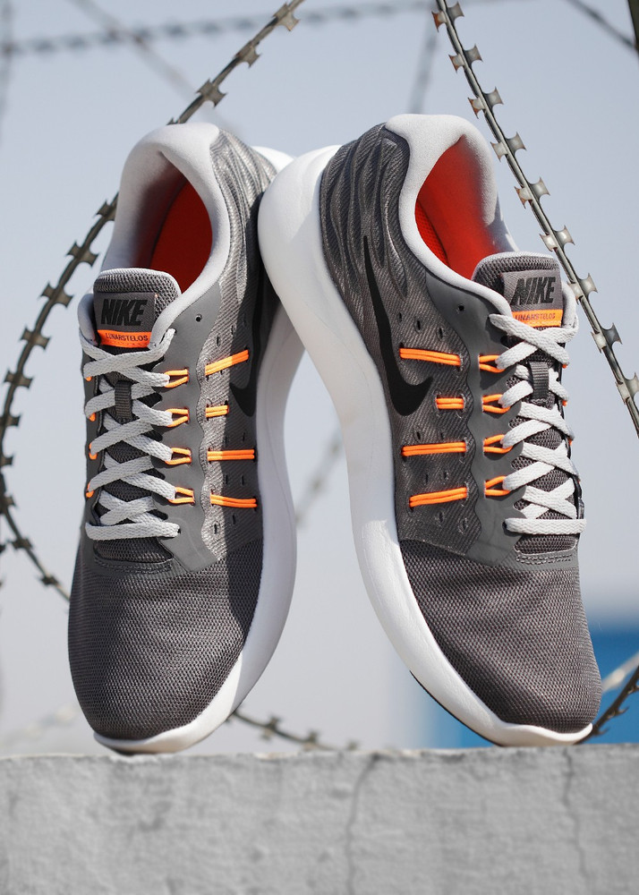 NIKE LUNARSTELOS Running Shoes For Men Buy DARK GREY BLACK WOLF GREY TOTA GRIS FONCE GRIS LOUP NOIR Color NIKE LUNARSTELOS Running Shoes For Men Online at Best Price Shop Online for Footwears in India...