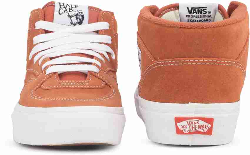 Orange low top vans best sale