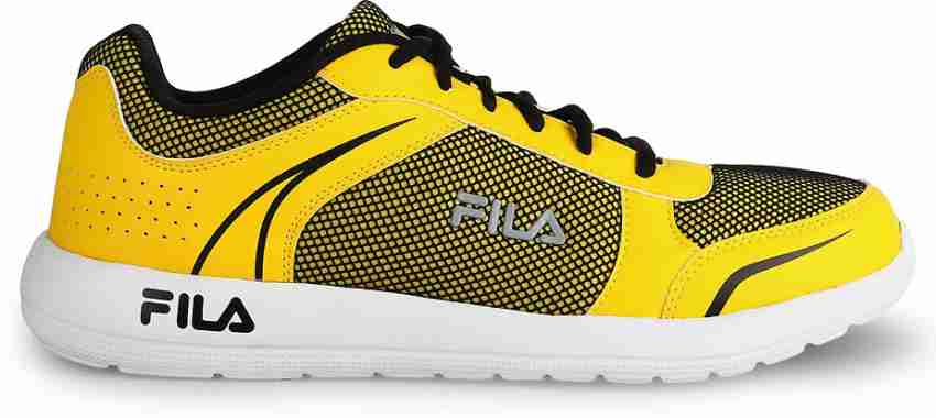 Fila yellow shop tennis shoes