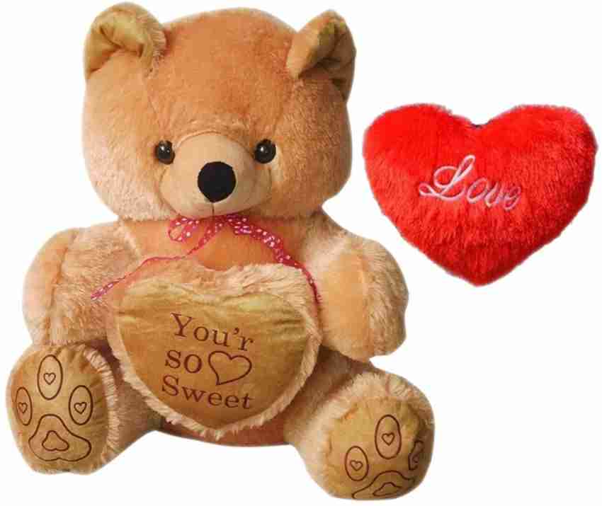 teddy bear with love symbol