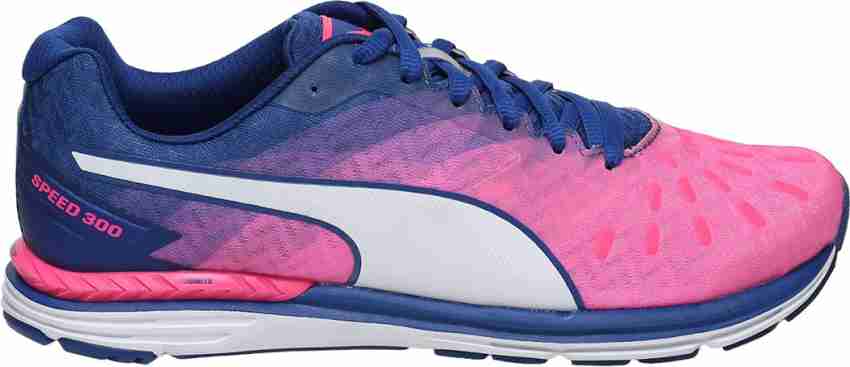 Puma pink and blue hotsell training shoes