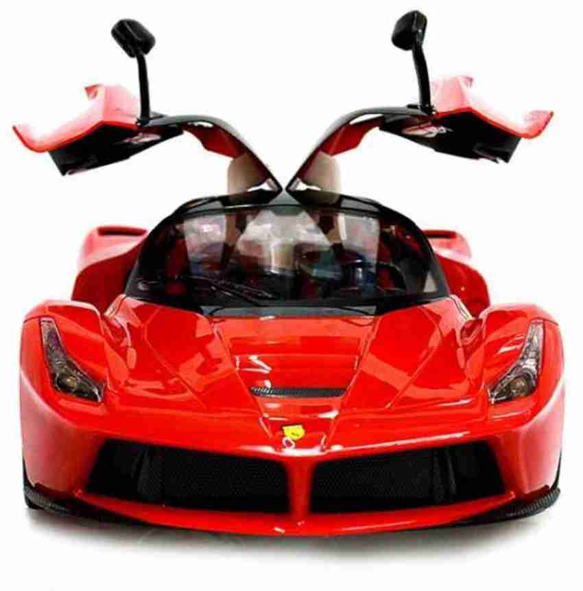 Burago red Ferrari car with baby toy remote +12 months