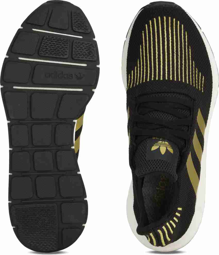 Women's adidas swift run black gold on sale
