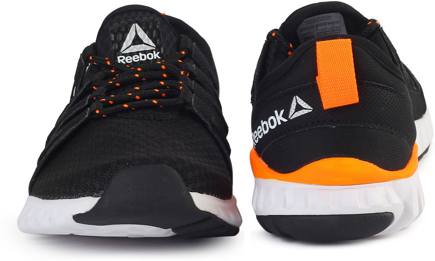 black and orange reebok shoes