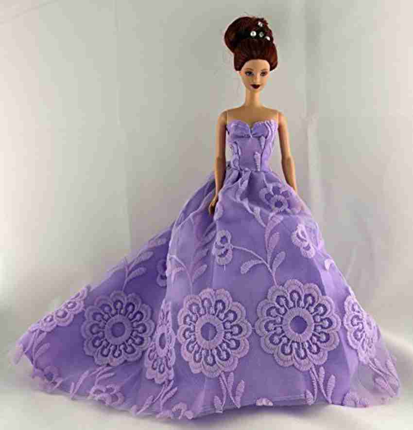 Barbie doll in purple dress deals