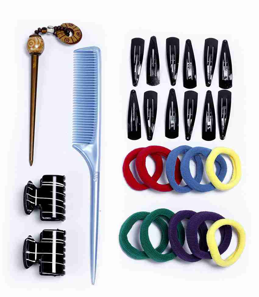 Premium Photo  Multi-colored hairbrush with rubber bands and hairpins.