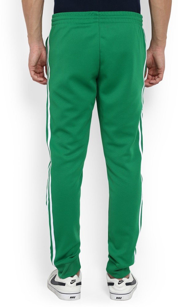 adidas Originals Superstar trackpants in green | ASOS
