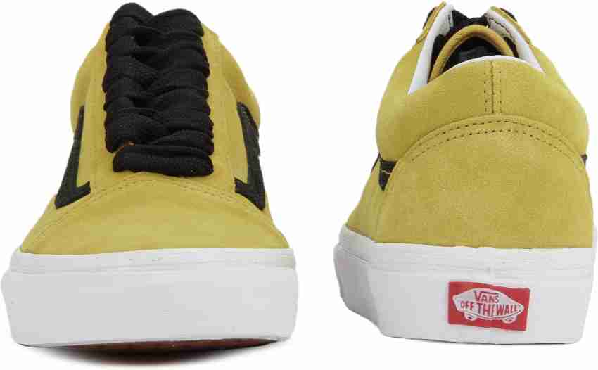 Black vans with yellow laces shops