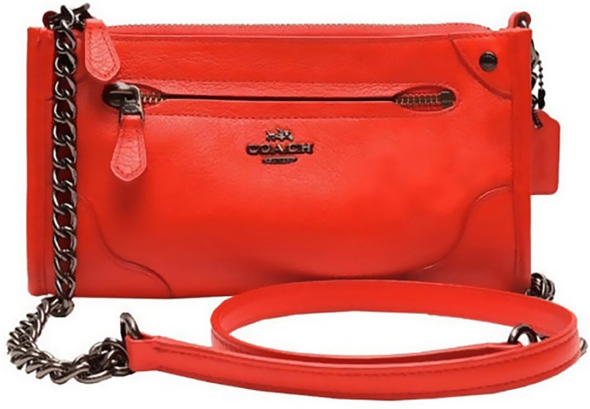 Coach orange sling bag top