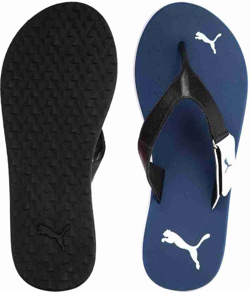 Puma deals blue slippers