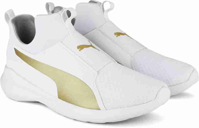 White and gold hot sale pumas shoes