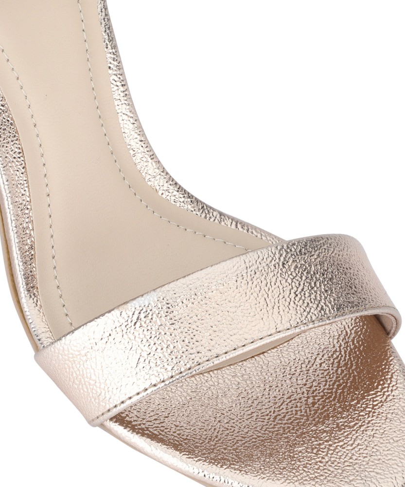 Catwalk clearance golden heels