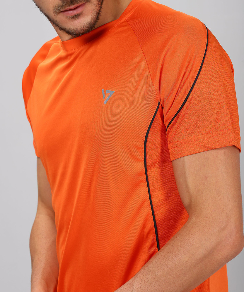 Seven By MS Dhoni Solid Men Round Neck Orange T Shirt