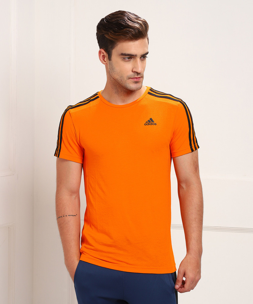 Adidas black shop orange stripes
