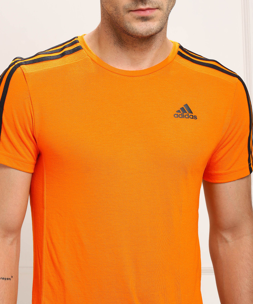 Orange and black adidas t 2025 shirt