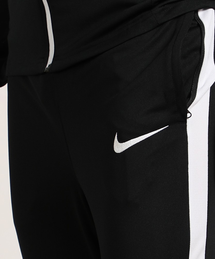 Nike black and hotsell white tracksuit