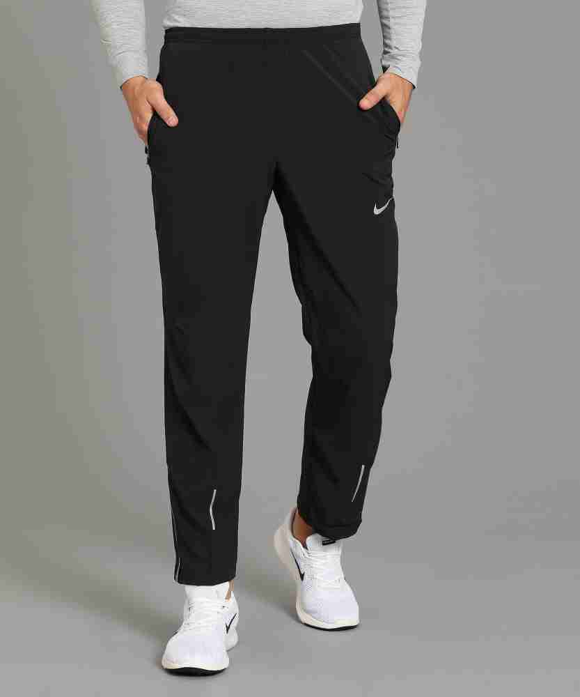 Nike track best sale pants reflective