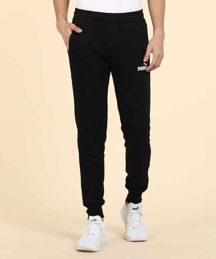 PUMA Pants Solid Men Black Track Pants - Buy PUMA Pants Solid Men Black  Track Pants Online at Best Prices in India