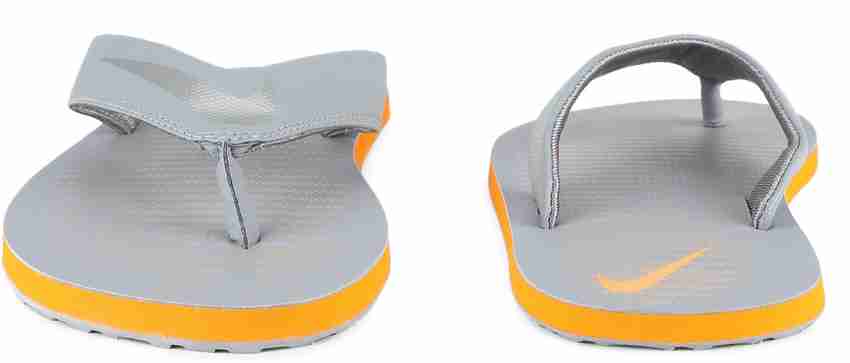 Nike orange slippers sales