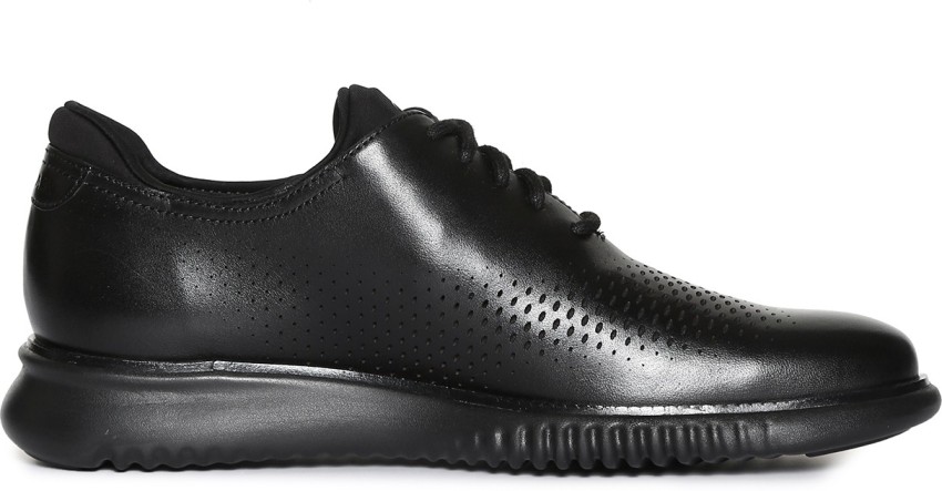 Cole haan black hot sale casual shoes