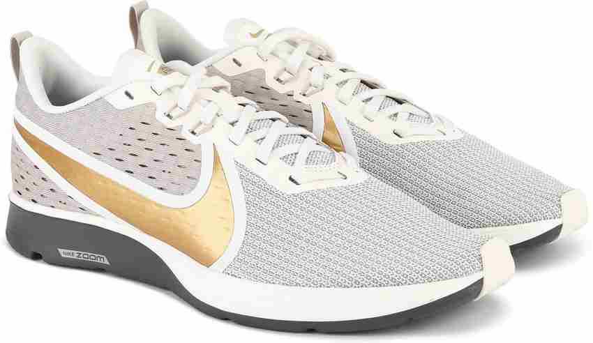 Women's zoom strike 2 premium running sneakers from finish sales line