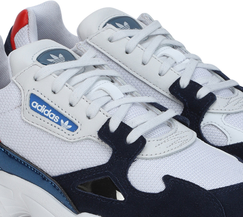 adidas white and navy falcon