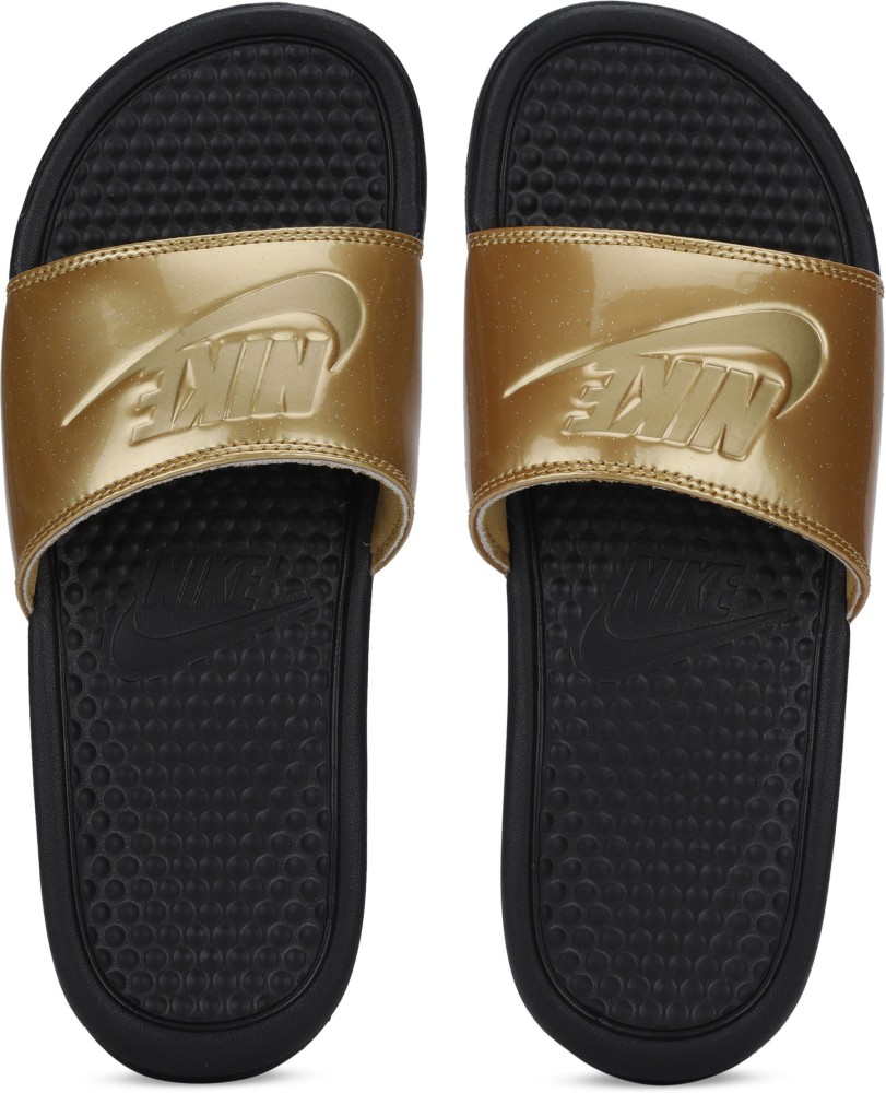 Black and gold nike flip flops best sale