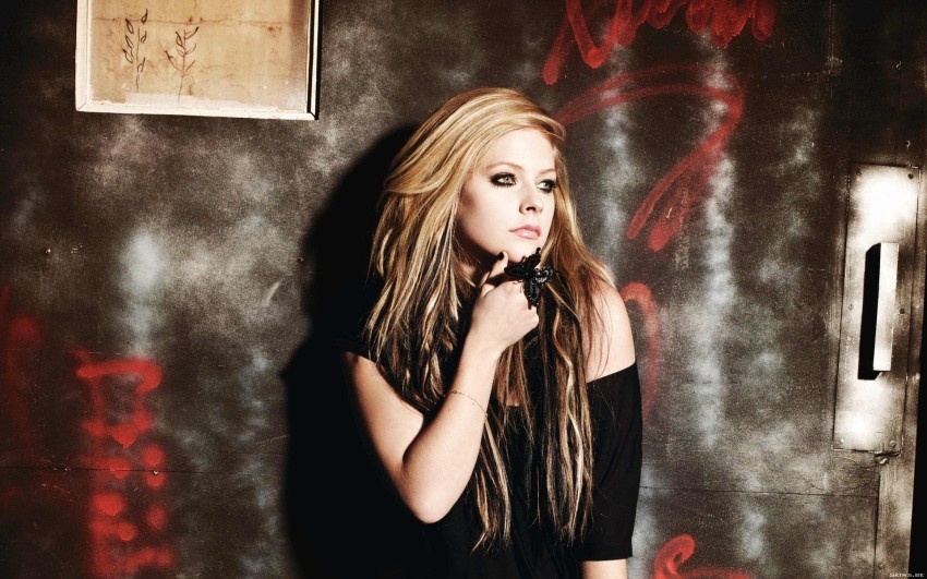 Avril Lavigne Wallpaper 4K 5K Orange background 12595