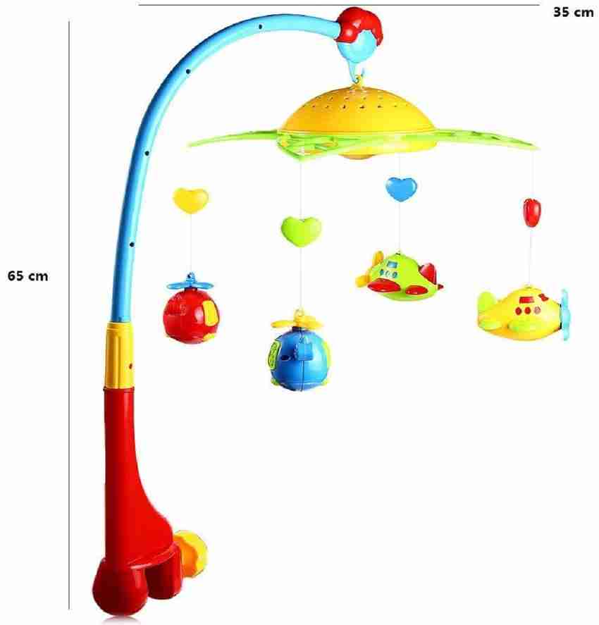 Rotating toy for cradle clearance