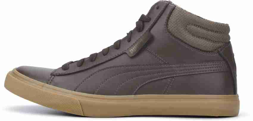 Puma men's grip 2024 mid idp sneakers