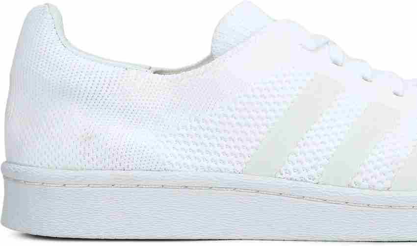Adidas originals superstar boost primeknit hotsell sneakers in white