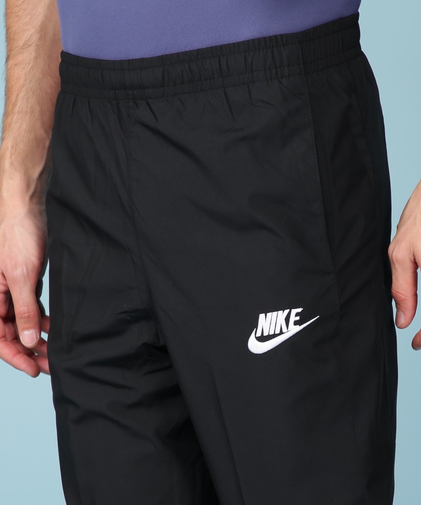 Nike sportswear men's discount core woven track pants