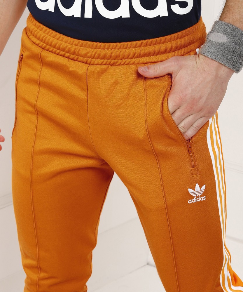 Buy Adidas Originals Orange Stripes Adibreak TP Trackpants for Women Online   Tata CLiQ Luxury