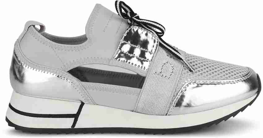 Bebe clearance silver sneakers