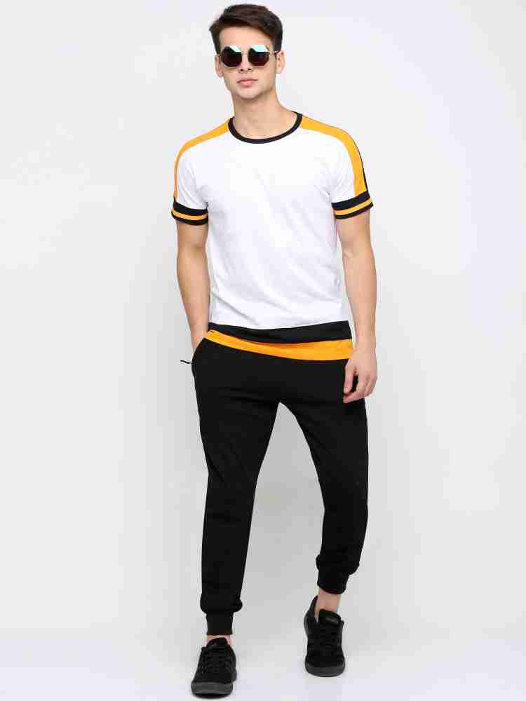 Yellow track pants outlet with black stripe
