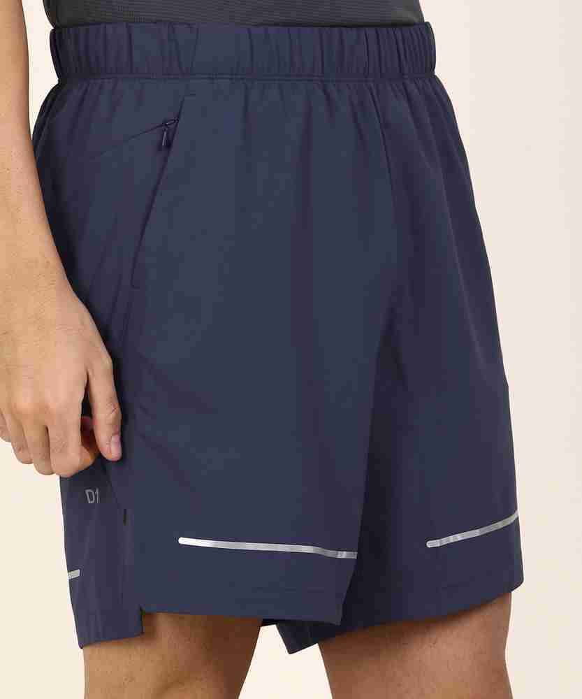 Asics d1 shorts deals