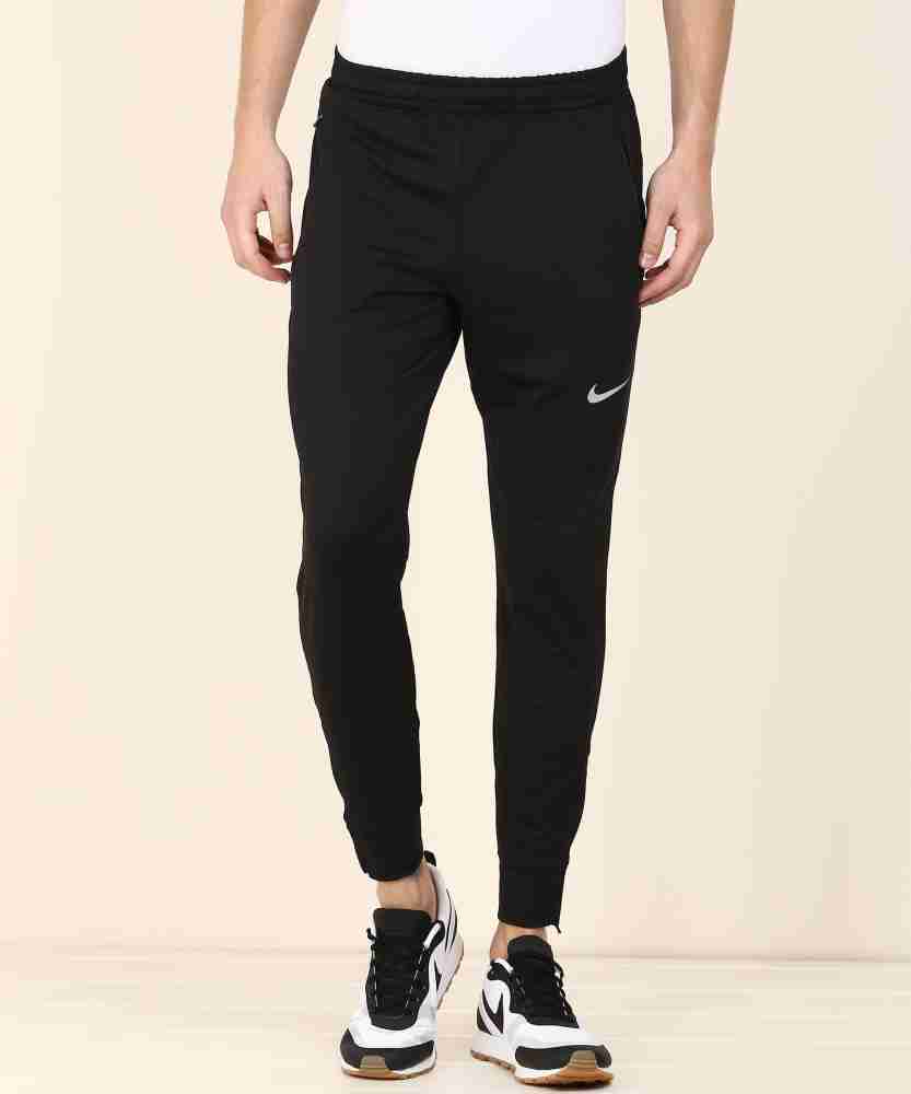 Nike solid on sale men's track pants