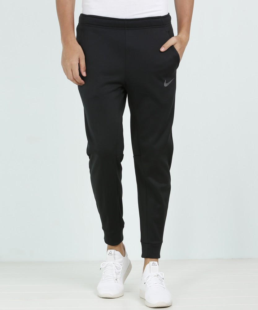 NIKE Solid Men Black Track Pants Buy NIKE Solid Men Black Track