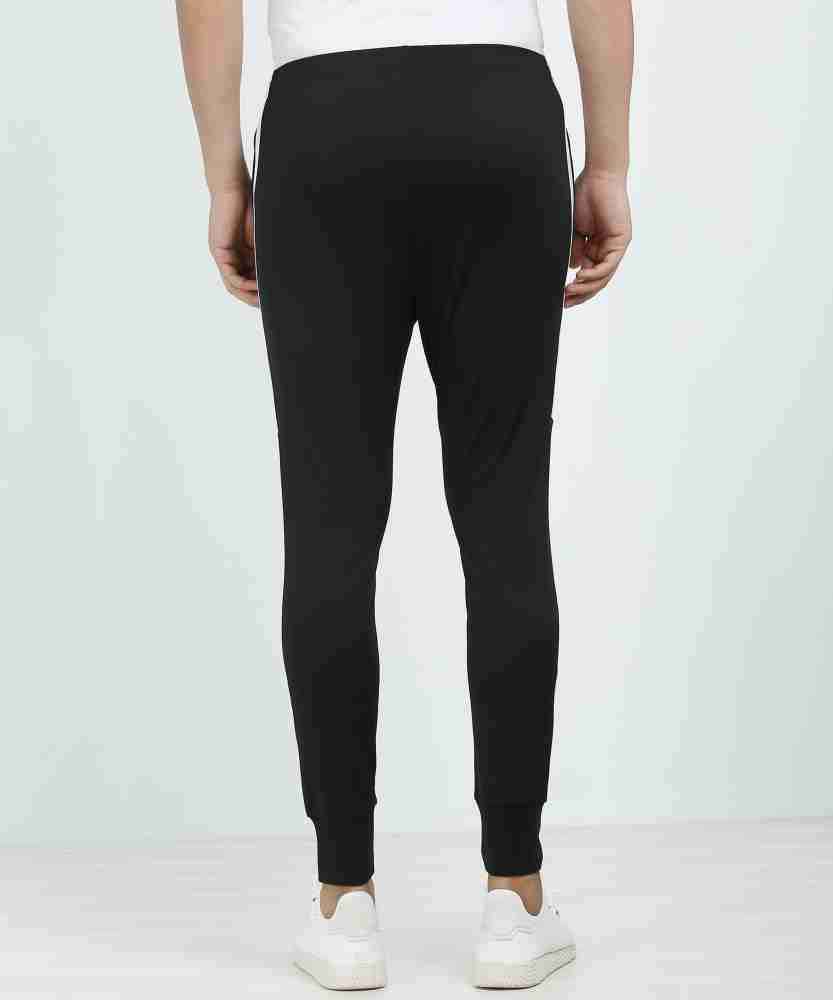 NIKE Solid Men Black Track Pants - Buy NIKE Solid Men Black Track Pants  Online at Best Prices in India