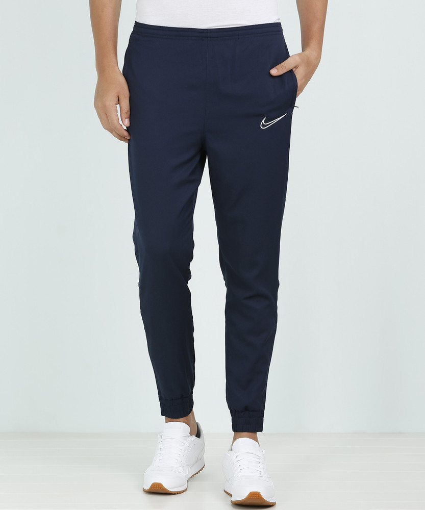 nike track pants dark blue