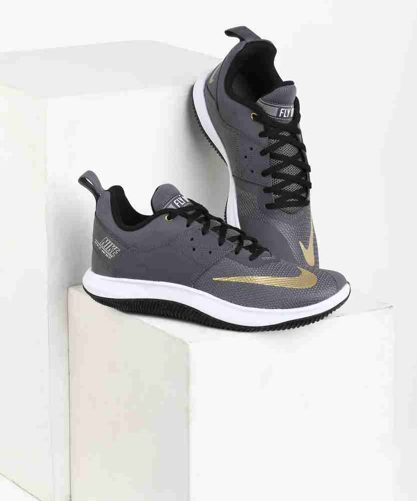 Nike flyby low hot sale black and gold