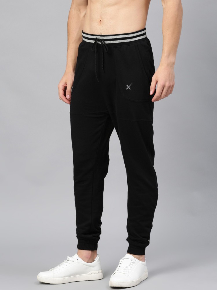 Buy HRX by Hrithik Roshan Women Black Solid Joggers - Track Pants