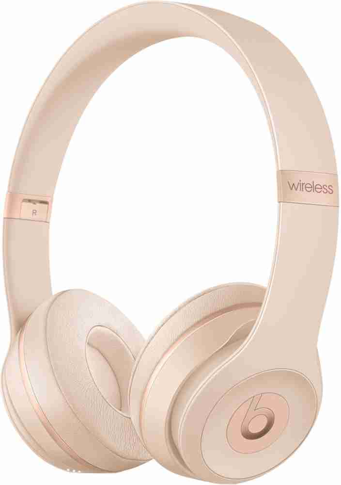 Beats black discount and gold headphones