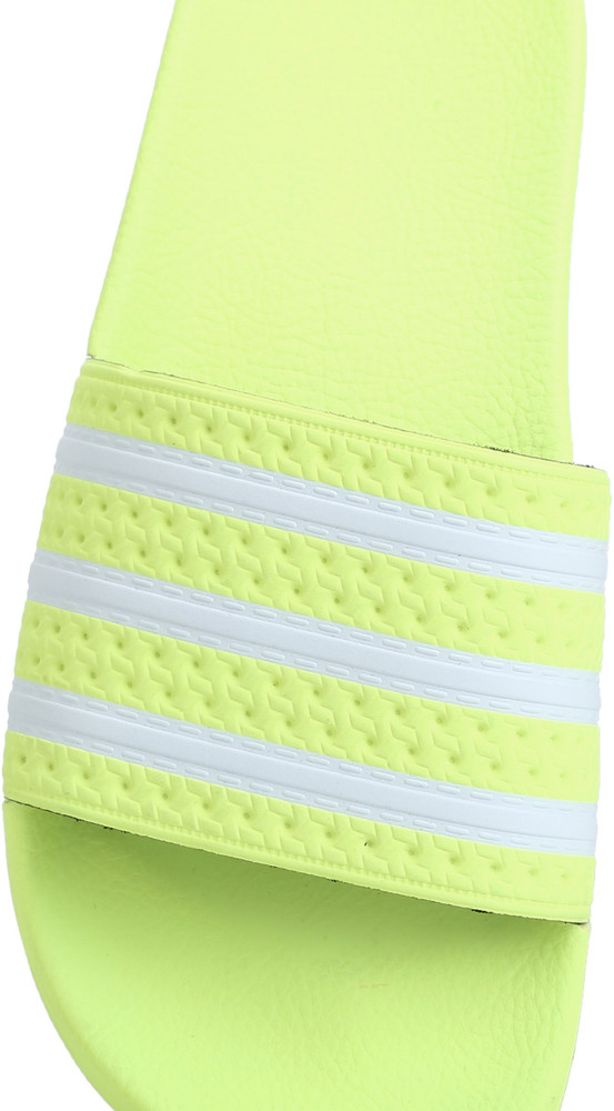 Lime green adidas best sale slides