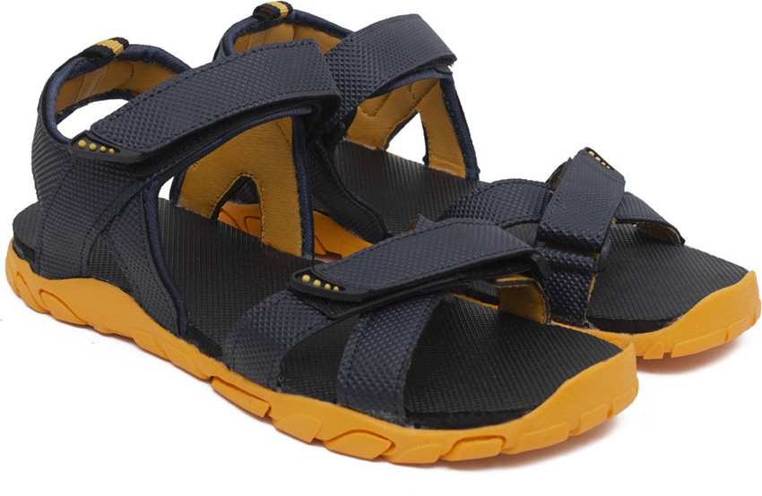 Yellow teva 2025 sandals